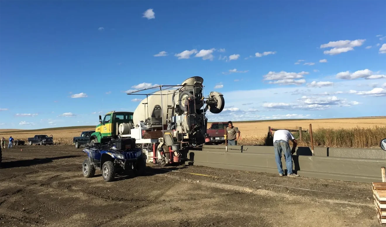 Roadside view of concrete forms being poured