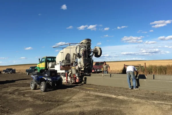 Roadside view of concrete forms being poured