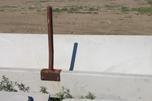 Closeup view of concrete fence line yard bunk high capacity