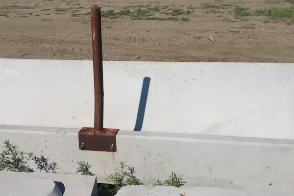 Closeup view of concrete fence line yard bunk high capacity